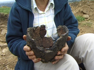 Click to enlarge image of Ann with reconstrucetd Mellor Pot