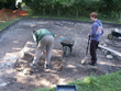 Click to enlarge Image of volunteers excavating