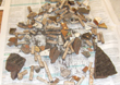 Click to enlarge image of clay pipes and pottery from subsoil