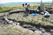 Click to enlarge image of volunteers at Shaw Cairn